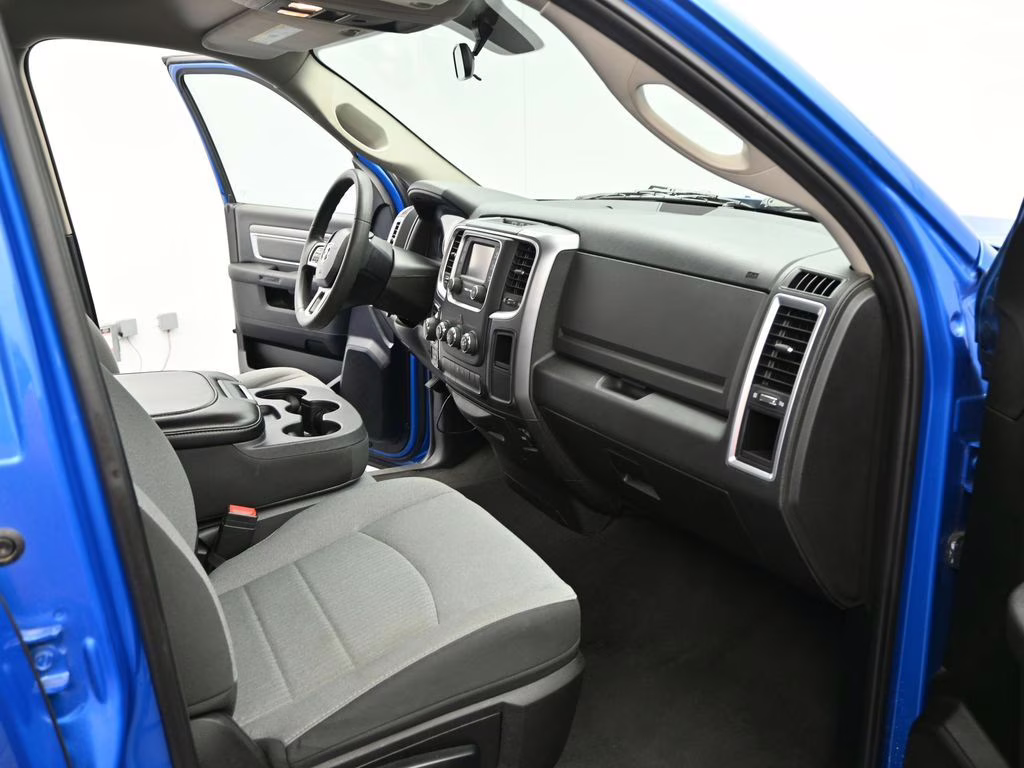 2024 Hydro Blue Pearlcoat Ram 1500 Classic SLT 4X4 Truck