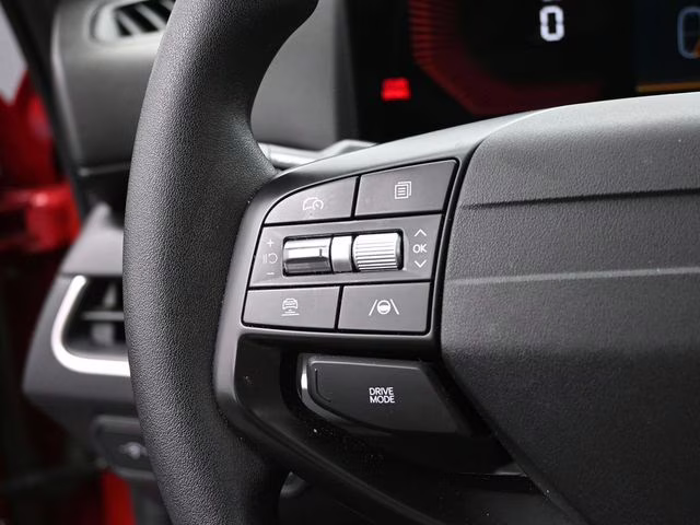 2025 Currant Red Kia K4 LXS FWD Sedan