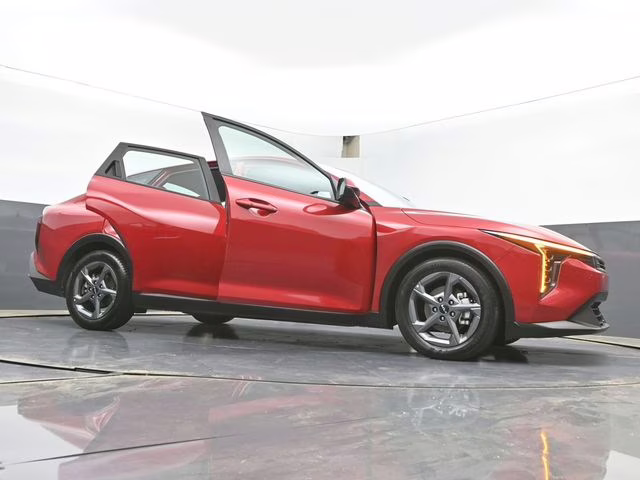 2025 Currant Red Kia K4 LXS FWD Sedan