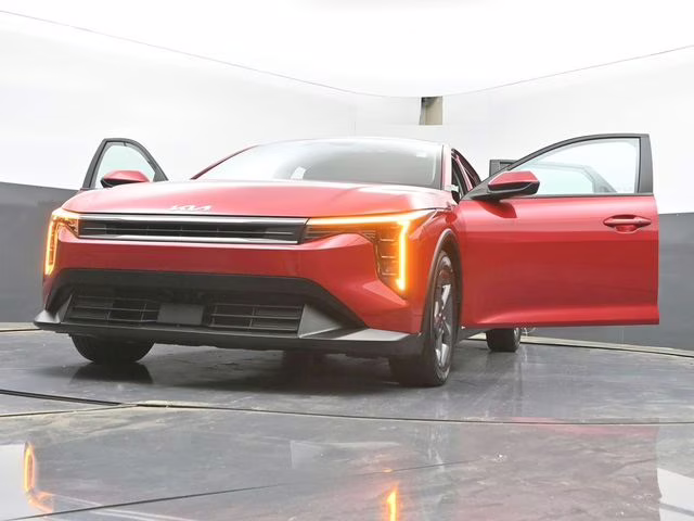2025 Currant Red Kia K4 LXS FWD Sedan