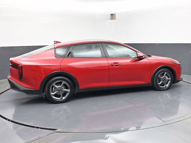 2025 Currant Red Kia K4 LXS FWD Sedan
