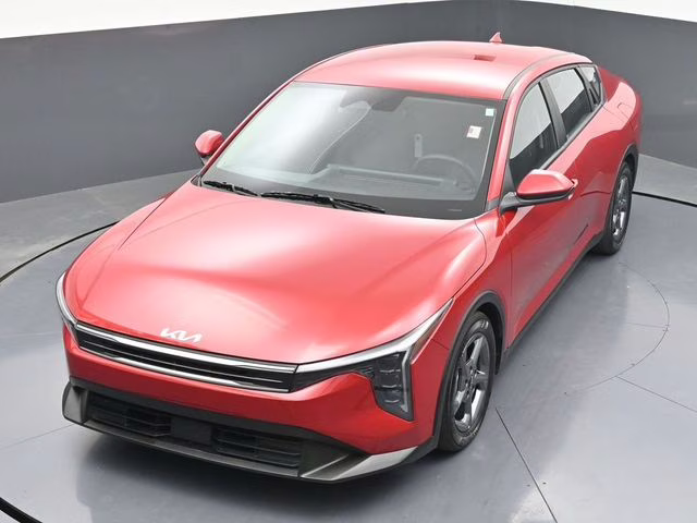 2025 Currant Red Kia K4 LXS FWD Sedan