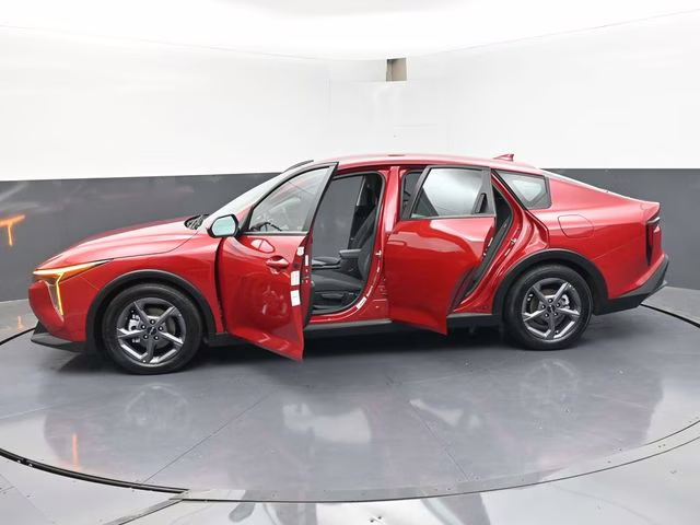 2025 Currant Red Kia K4 LXS FWD Sedan