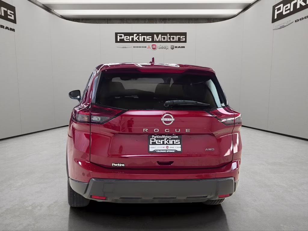 2025 Scarlet Ember Tintcoat Nissan Rogue SV AWD SUV