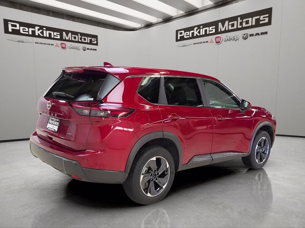 2025 Scarlet Ember Tintcoat Nissan Rogue SV AWD SUV