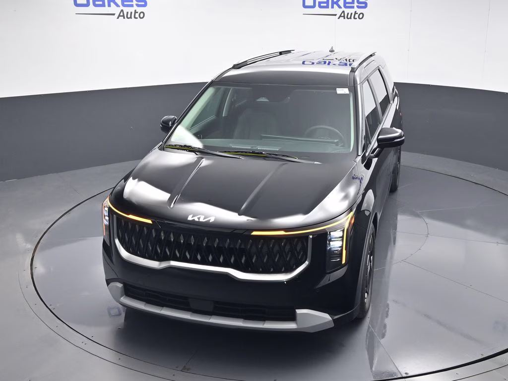 2026 Aurora Black Pearl Kia Carnival EX FWD Van