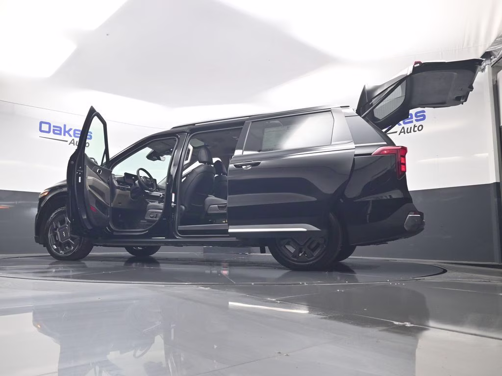 2026 Aurora Black Pearl Kia Carnival SX FWD Van