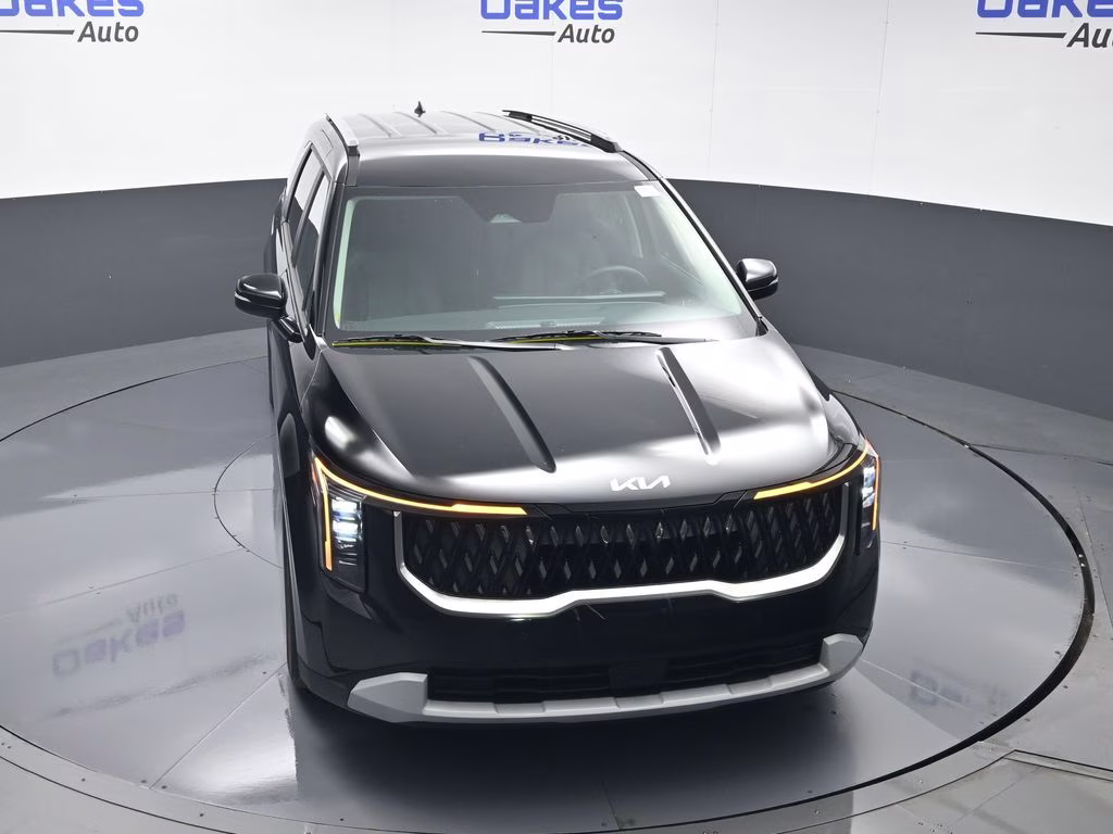 2026 Aurora Black Pearl Kia Carnival EX FWD Van