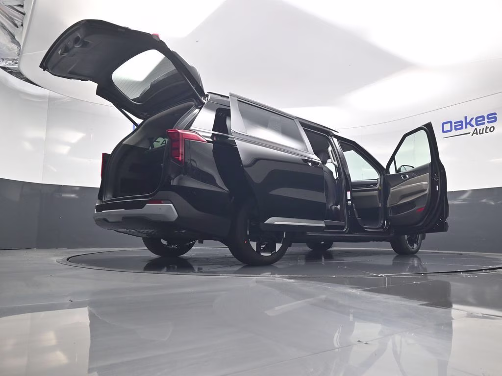 2026 Aurora Black Pearl Kia Carnival EX FWD Van