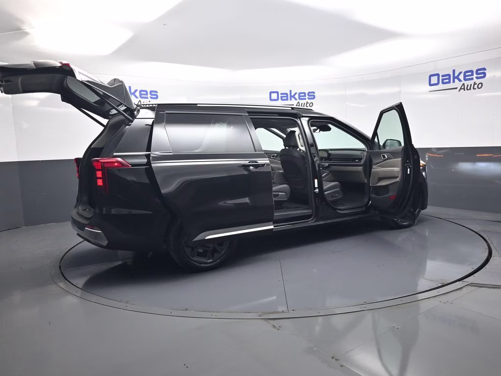 2026 Aurora Black Pearl Kia Carnival SX FWD Van