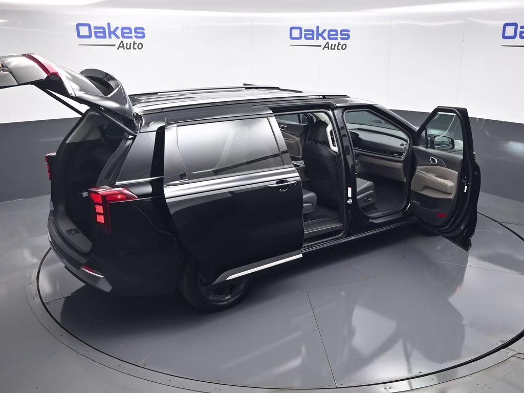 2026 Aurora Black Pearl Kia Carnival SX FWD Van