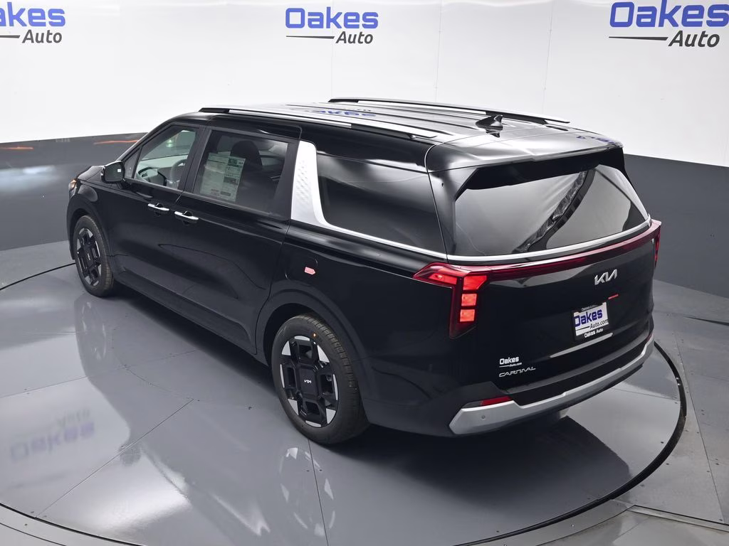 2026 Aurora Black Pearl Kia Carnival EX FWD Van