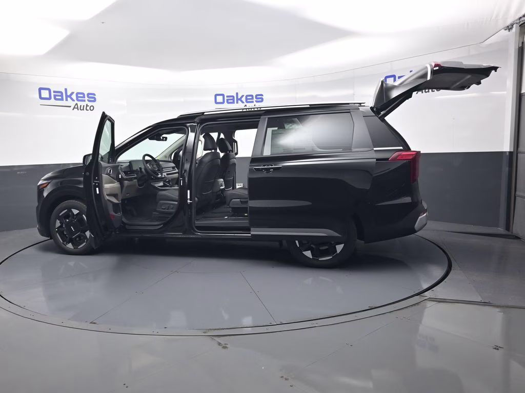 2026 Aurora Black Pearl Kia Carnival EX FWD Van
