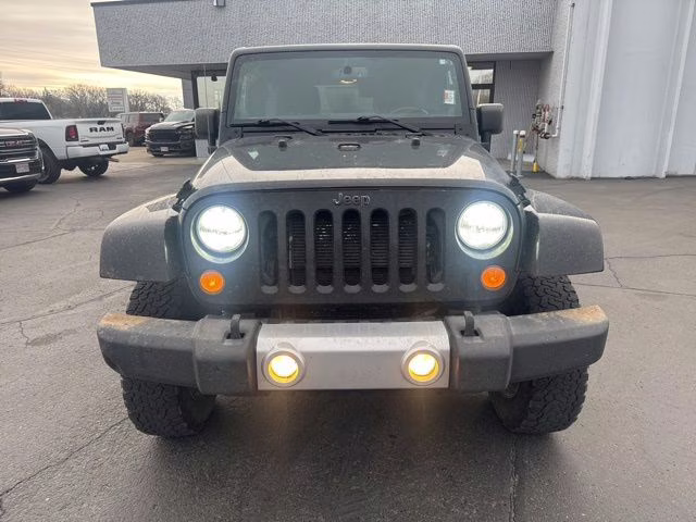 Used 2014 Jeep Wrangler Unlimited Sahara with VIN 1C4BJWEG2EL328881 for sale in Waite Park, Minnesota