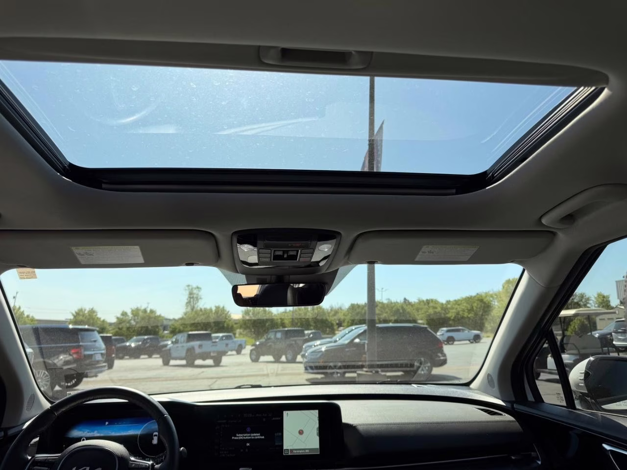 2024 Snow White Pearl Kia Carnival SX Prestige FWD Van