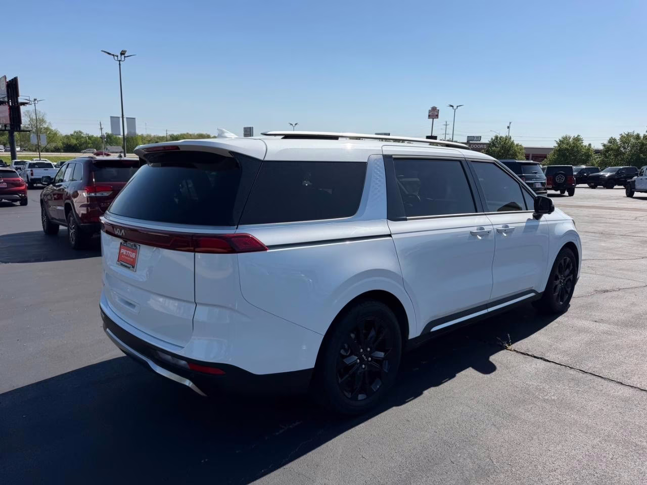 2024 Snow White Pearl Kia Carnival SX Prestige FWD Van
