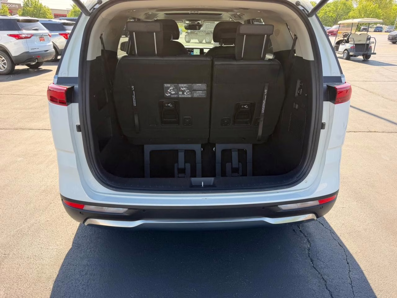 2024 Snow White Pearl Kia Carnival SX Prestige FWD Van