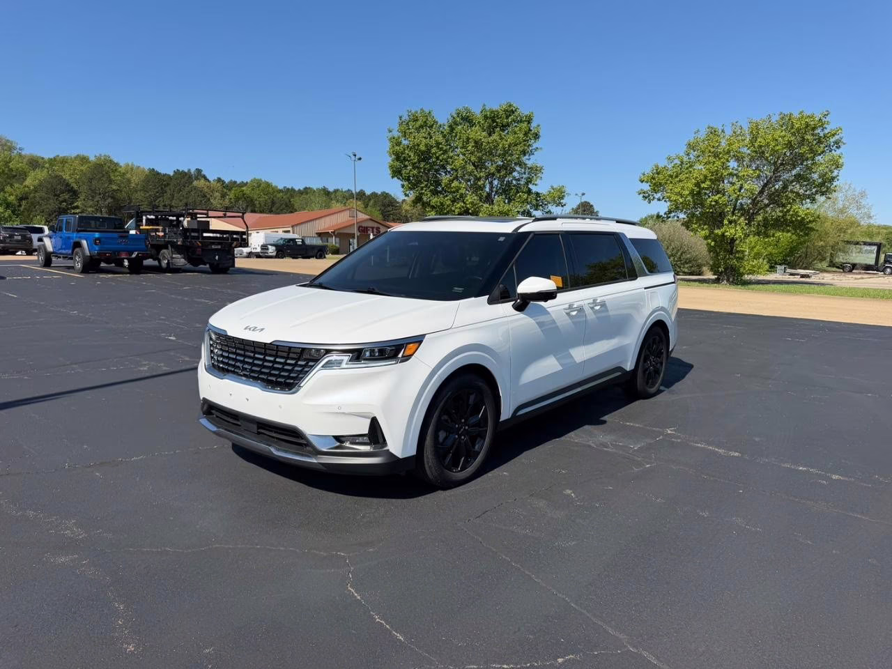 2024 Snow White Pearl Kia Carnival SX Prestige FWD Van