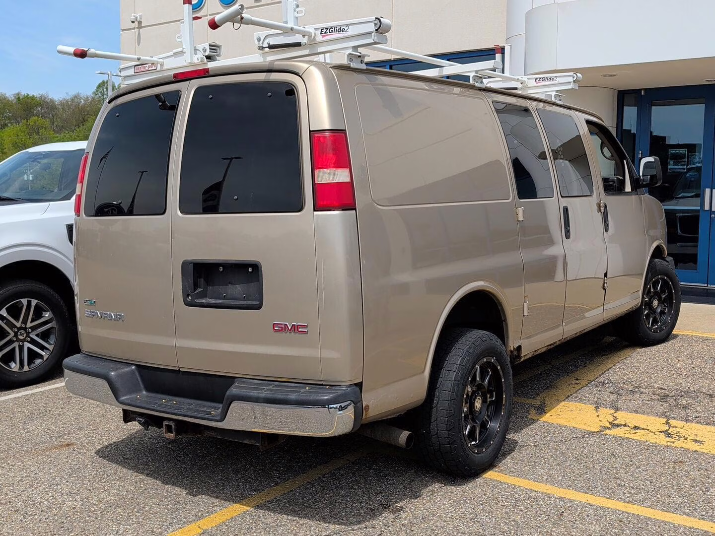 2011 Sand Beige Metallic GMC Savana Cargo Van RWD Van