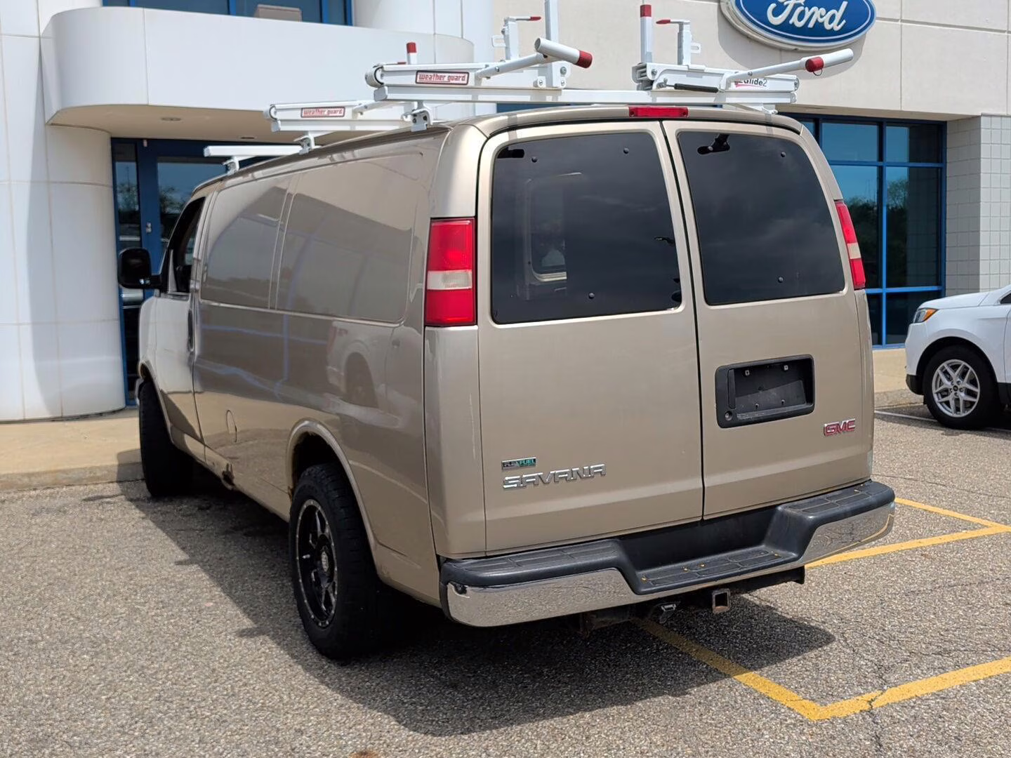 2011 Sand Beige Metallic GMC Savana Cargo Van RWD Van