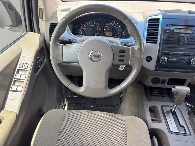 2009 Red Brick Nissan Frontier SE RWD Truck