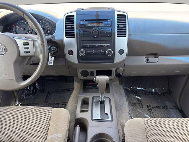 2009 Red Brick Nissan Frontier SE RWD Truck