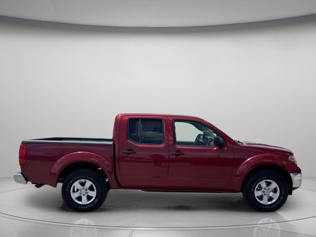 2009 Red Brick Nissan Frontier SE RWD Truck