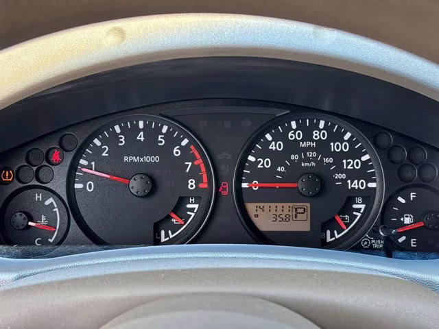 2009 Red Brick Nissan Frontier SE RWD Truck