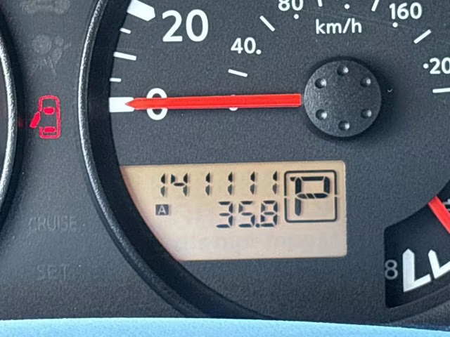2009 Red Brick Nissan Frontier SE RWD Truck