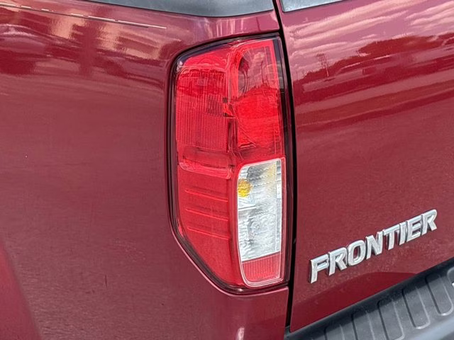 2009 Red Brick Nissan Frontier SE RWD Truck