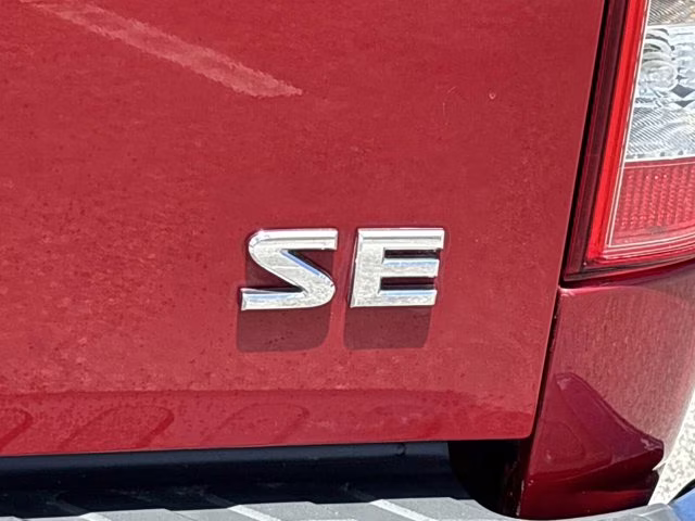 2009 Red Brick Nissan Frontier SE RWD Truck