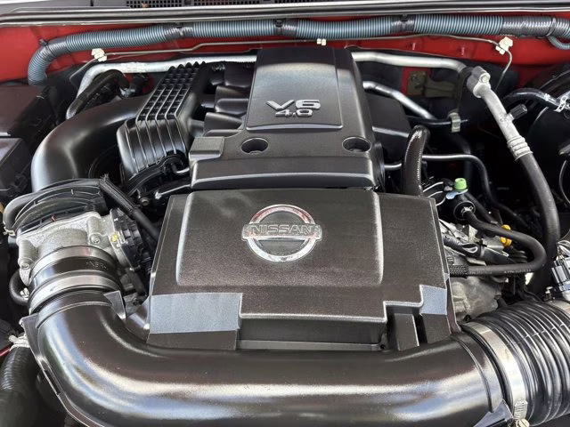 2009 Red Brick Nissan Frontier SE RWD Truck
