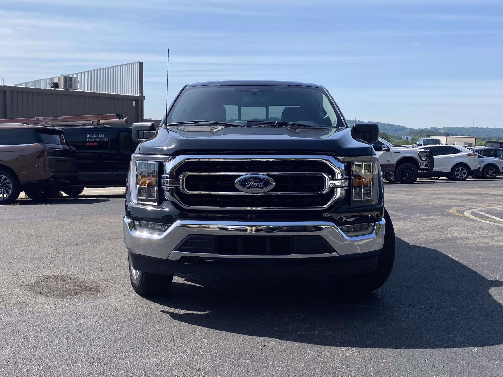 2023 Agate Black Metallic Ford F-150 XLT 4X4 Truck