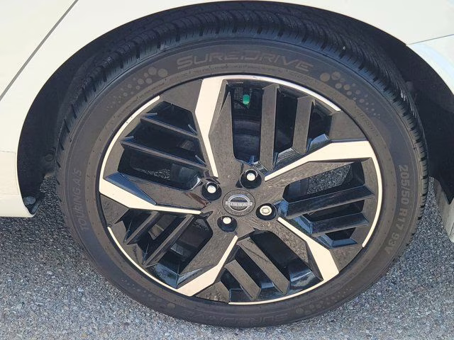 2023 Aspen White Nissan Versa 1.6 SR FWD Sedan