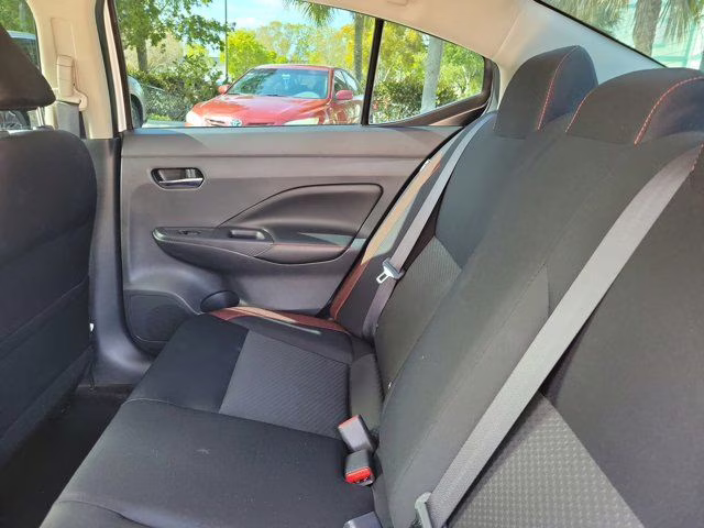 2023 Aspen White Nissan Versa 1.6 SR FWD Sedan