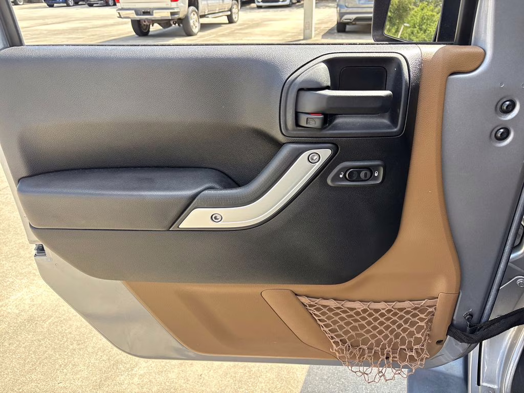 2016 Billet Silver Metallic Clearcoat Jeep Wrangler Unlimited Sahara 4X4 SUV