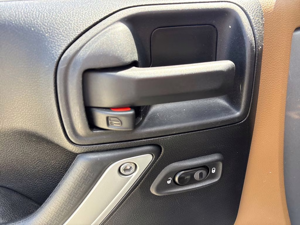 2016 Billet Silver Metallic Clearcoat Jeep Wrangler Unlimited Sahara 4X4 SUV