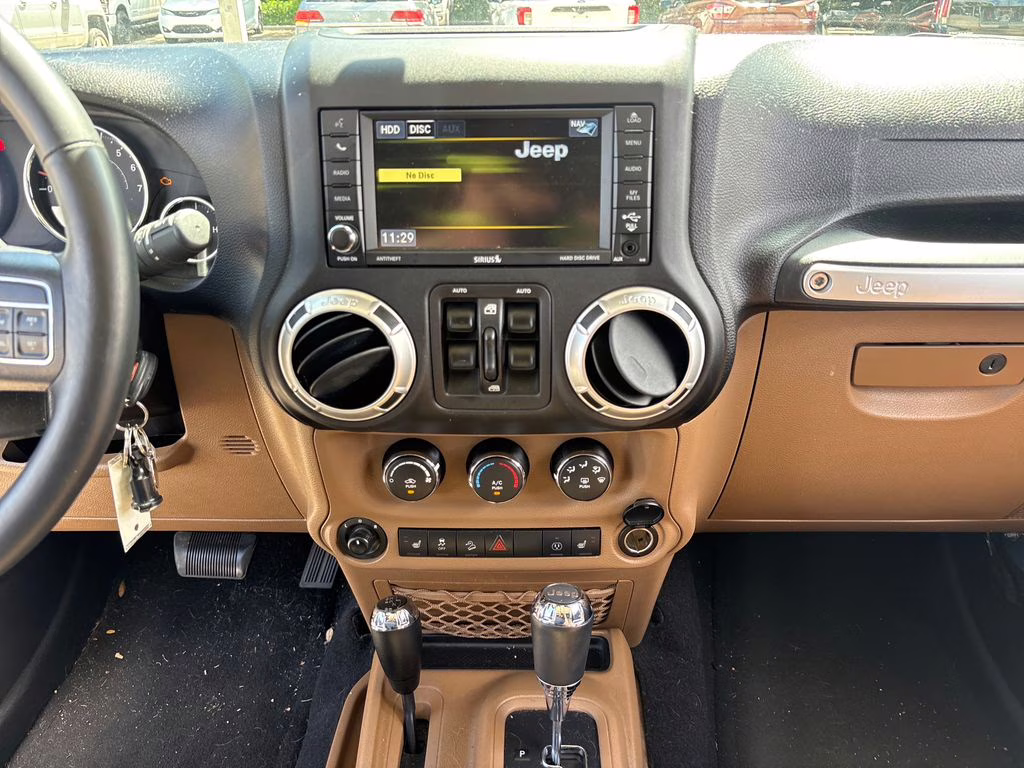 2016 Billet Silver Metallic Clearcoat Jeep Wrangler Unlimited Sahara 4X4 SUV