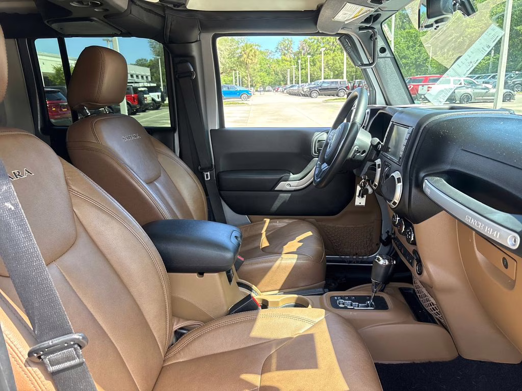 2016 Billet Silver Metallic Clearcoat Jeep Wrangler Unlimited Sahara 4X4 SUV