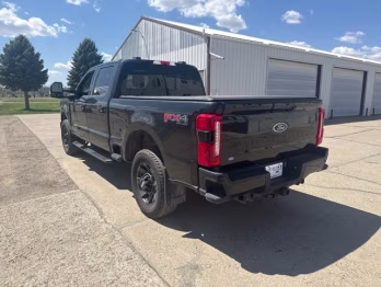 2023 Agate Black Metallic Ford Super Duty F-250 SRW LARIAT 4X4 Truck