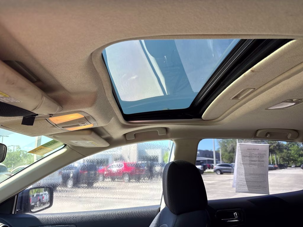 2009 Indigo Blue Metallic Nissan Rogue SL FWD SUV