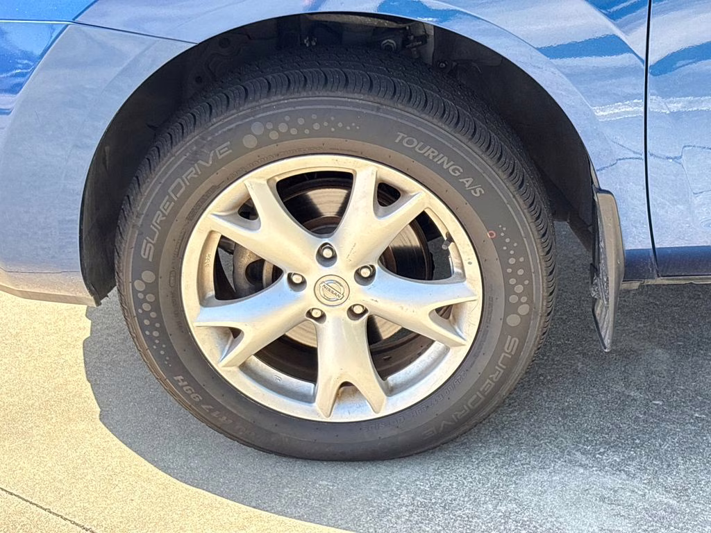 2009 Indigo Blue Metallic Nissan Rogue SL FWD SUV