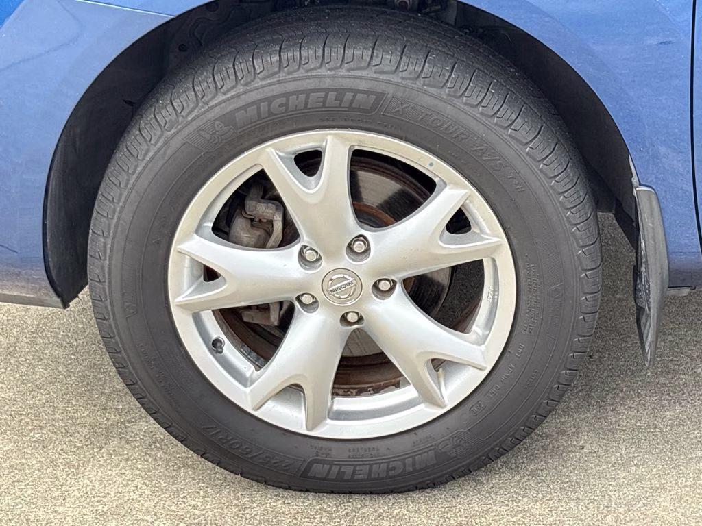2009 Indigo Blue Metallic Nissan Rogue SL FWD SUV