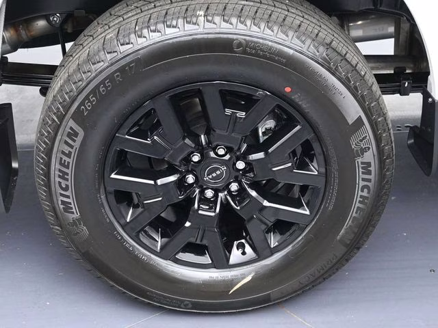 2026 Glacier White Nissan Frontier SV 4X4 Truck