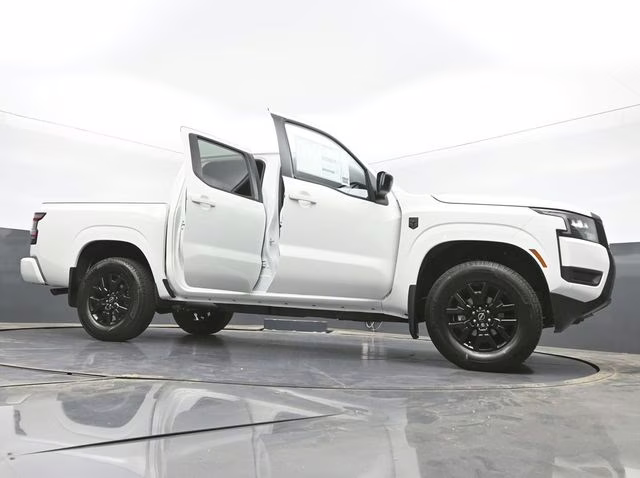 2026 Glacier White Nissan Frontier SV 4X4 Truck