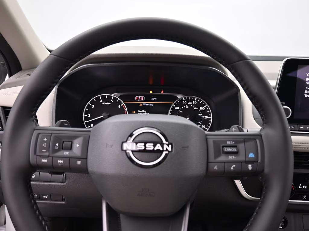 2026 Everest White Pearl Tricoat Nissan Rogue Dark Armor FWD SUV