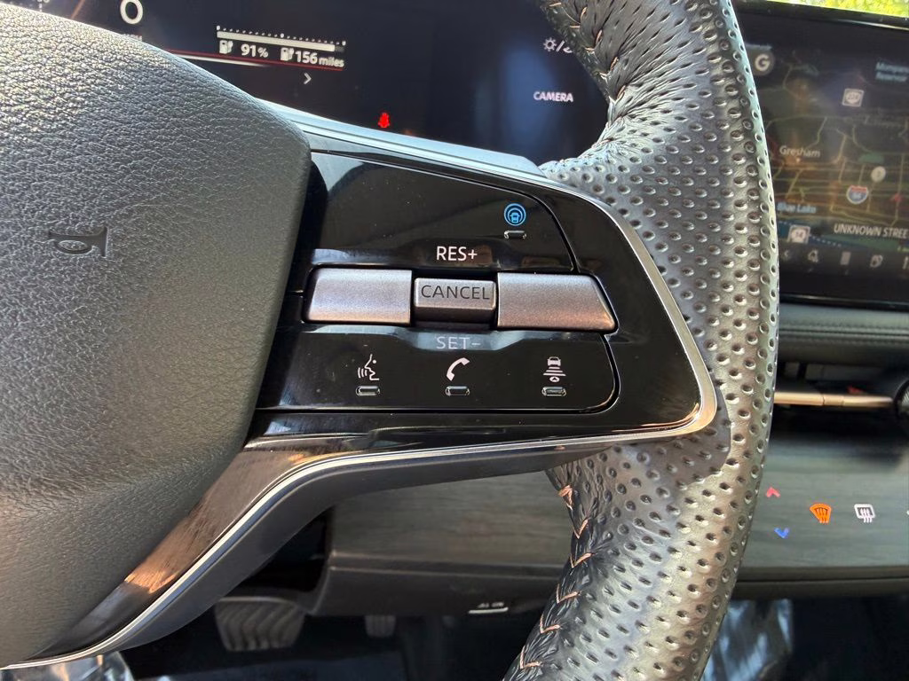 2024 Brilliant Silver Metallic/Black Diamond Pearl Nissan ARIYA ENGAGE e-4ORCE AWD SUV