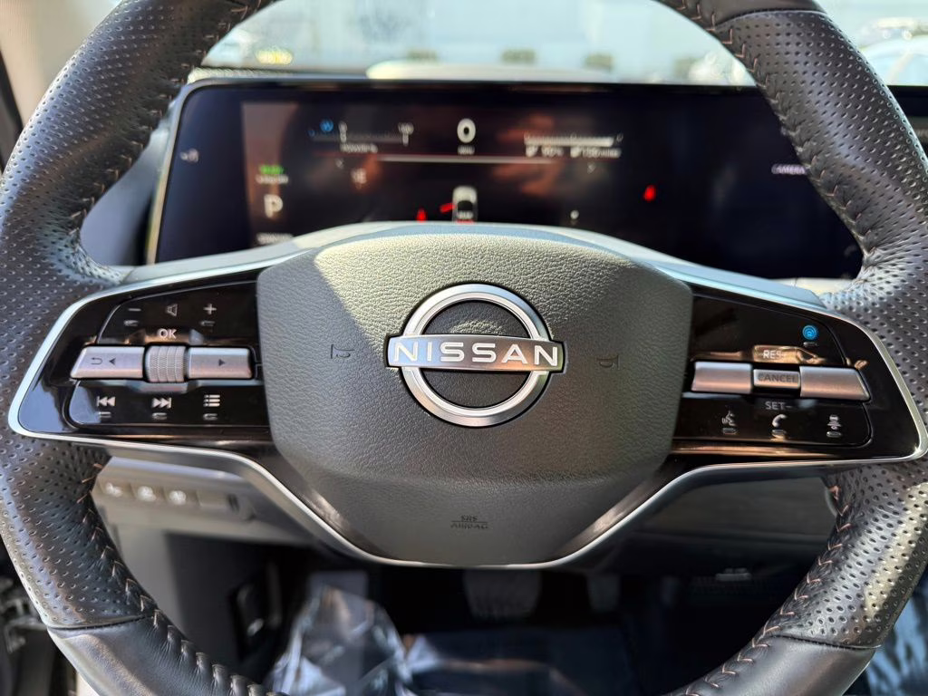2024 Brilliant Silver Metallic/Black Diamond Pearl Nissan ARIYA ENGAGE e-4ORCE AWD SUV