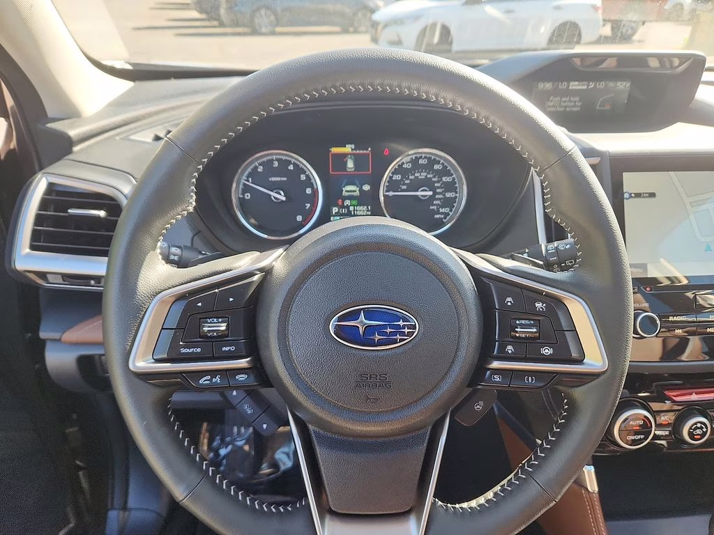 2023 Bronze Metallic Subaru Forester Touring AWD SUV
