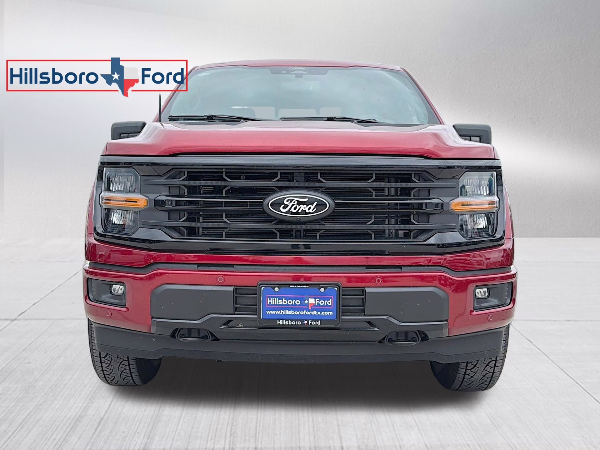 2026 Ruby Red Metallic Tinted Clearcoat Ford F-150 XLT 4X4 Truck